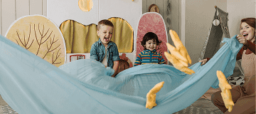 Children playing in a tiney home