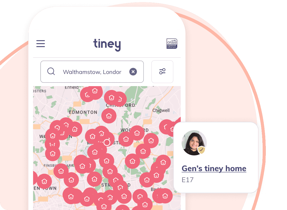 Childminder smiling at a child